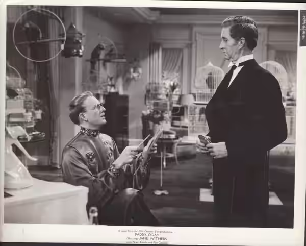 Press photo of Pinky Tomlin and Russell Simpson in the 1935 film "Paddy O'Day"