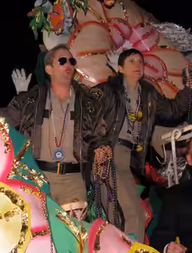 Cast members of television comedy "Reno 911" on float of Orpheus parade, New Orleans Mardi Gras (2009)