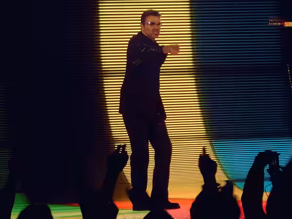 George Michael performing at the Olympiahalle arena (Munich, Germany) in 2006, for the 25 Live tour.
