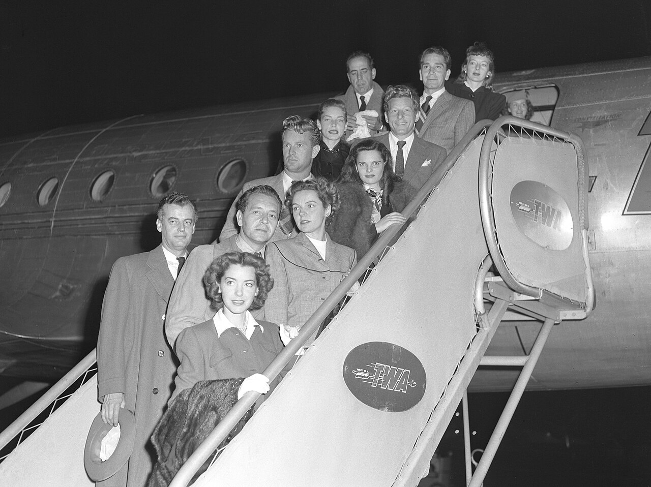 Members of the Hollywood Committee for the First Amendment disembarking plane in Los Angeles, California. The members are Marsha Hunt, Shepperd Strudwick, Paul  (1947)