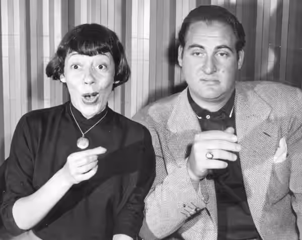 Promotional photo of Imogene Coca and Sid Caesar from Your Show of Shows, 1952. This photo was produced prior to 1978 and has no copyright markings. The show wa