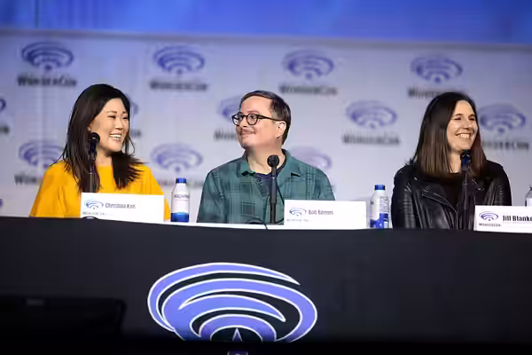 Christina Kim, Bob Berens and Jill Blankenship speaking at the 2022 WonderCon, for "TV Guide Magazine’s 2022 Fan Favorites: Warner Bros. Television Showrunners 