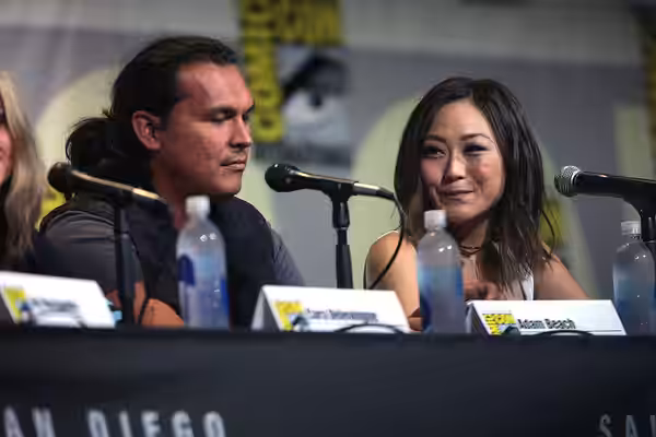Adam Beach and Karen Fukuhara speaking at the 2016 San Diego Comic Con International, for "Suicide Squad", at the San Diego Convention Center in San Diego, Cali