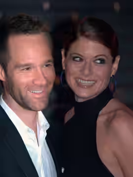 Chris Diamantopoulos and Debra Messing at the Vanity Fair kickoff part for the 2009 Tribeca Film Festival.