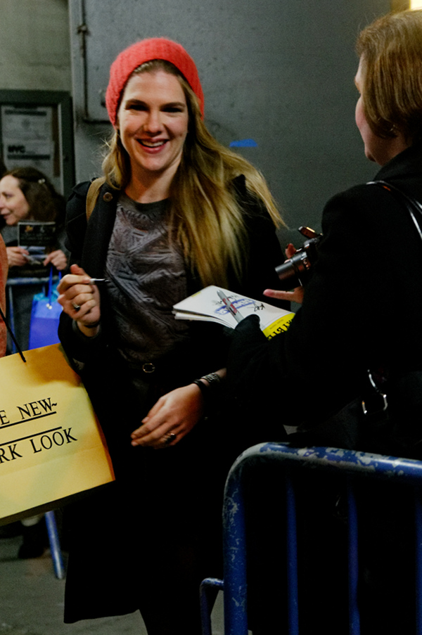 Lily Rabe signing autographs for pictures at the stage door of the John Golden Theater, after the matinee performance of Seminar on Saturday 12 November 2011.