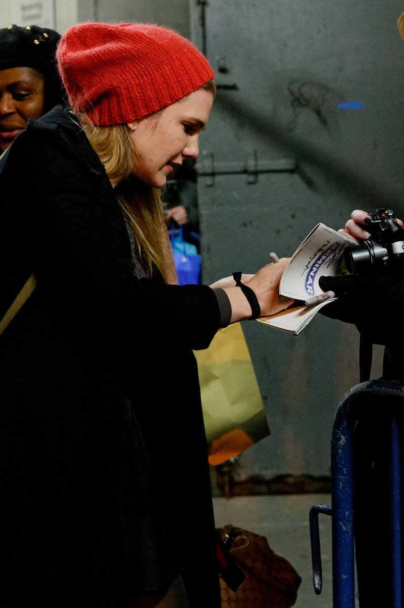 Lily Rabe signing autographs for pictures at the stage door of the John Golden Theater, after the performance of Seminar on Saturday 12 November 2011.
