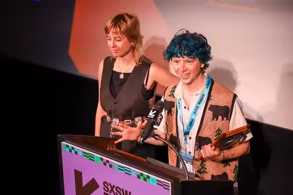 Eros Vlahos (Eros V) on stage at the SXSW 2024 Film Festival award ceremony that took place at the Paramount Theatre in Austin, Texas. Vlahos won the SXSW 2024 