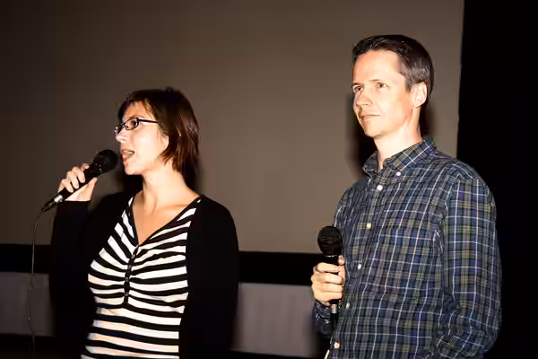 John Cameron Mitchell &amp; Michaela Pňačeková (left) during Q&amp;A at Mezipatra gay &amp; lesbian film festival 2006 at Kino Světozor, Prague, Czech Republic.