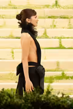 Maude Apatow at the 2026 Met Gala, wearing fashion in theme of "Costume Art"