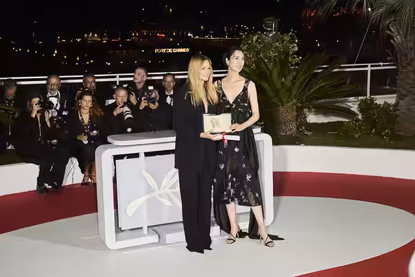 Virginie Efira and Tao Okamoto pose with the Best Actress award for "All Of A Sudden" during the Palme d'Or winners photocall at the 79th annual Cannes Film Fes (2026)