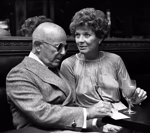 Agent Irving Lazar and actress Polly Bergen at party for Earl Blackwell in Los Angeles (1975)