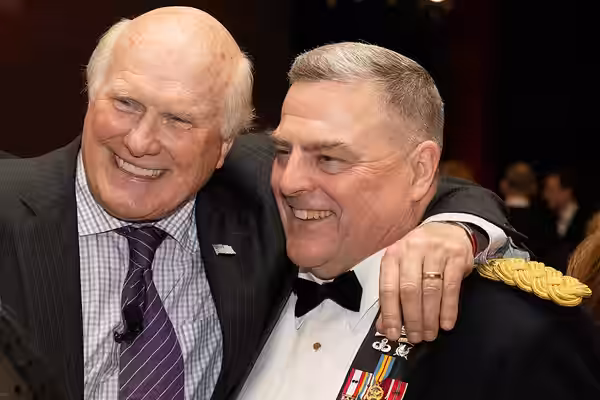 Terry Bradshaw, National Football League Hall of Fame Inductee and Sports Analyst, poses for a photo with Army Gen. Mark A. Milley, Chief of Staff of the Army,  (2019)