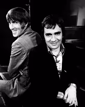 Publicity photo of Peter Cook and Dudley Moore from their revue "Good Evening". (1974)