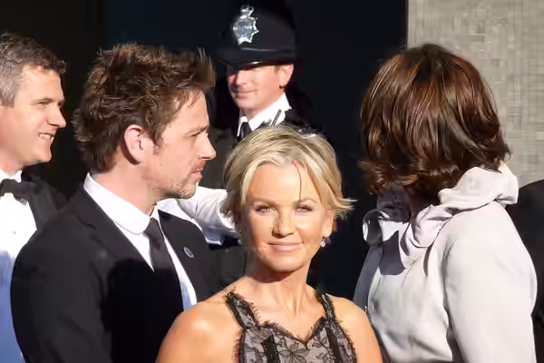 The Bill actors Lisa Maxwell and Dominic Power. On the red carpet at the BAFTA Awards, held at the Royal Festival Hall, on the Southbank in London. (2009)