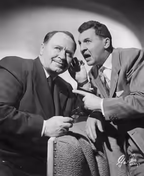 Photo of Howard Freeman (left) and Eddie Bracken in a scene from a stage version of The Seven Year Itch. (1954)