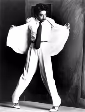 American singer Morris Day in a press photo dated to 1985. No copyright markings on the photo and no registration for this photo was found in the US Copyright C