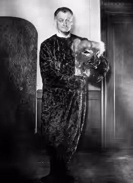 Photo of Art Carney in a dog costume for "The Man in the Dog Suit", which was aired as an episode of Carney's television program. Carney had his own NBC variety (1959)