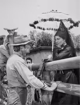 Photo of Clint Eastwood and guest star Viveca Lindfors from an episode of Rawhide. (1959)