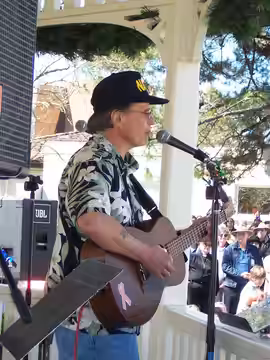 Country Joe plays at a anti-war rally in Walnut Creek, CA 2006
