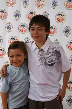 American child actors, brothers Raymond Ochoa (L) ("Cold Case") and Ryan Ochoa (R) ("The Perfect Game") on the red carpet at the 62nd Annual Mother Goose Parade (2008)