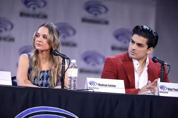 Madison Iseman and Diego Tinoco speaking at the 2023 WonderCon, for "Knights of the Zodiac", at the Anaheim Convention Center in Anaheim, California. Please att