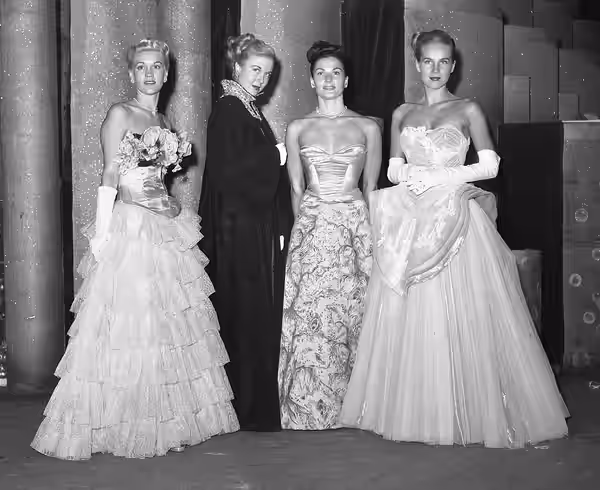 Evening gowns by Dorothy O'Hara, Orry-Kelly, Al Teitelbaum and Howard Greer. Published caption FORMAL ELEGANCE -- Evening mode originals by Dorothy O'Hara, Orry (1947)
