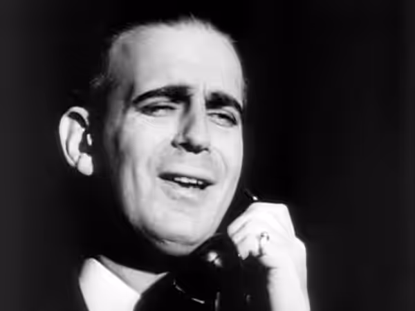 Screenshot of Paul Stewart from the Citizen Kane trailer (1940)