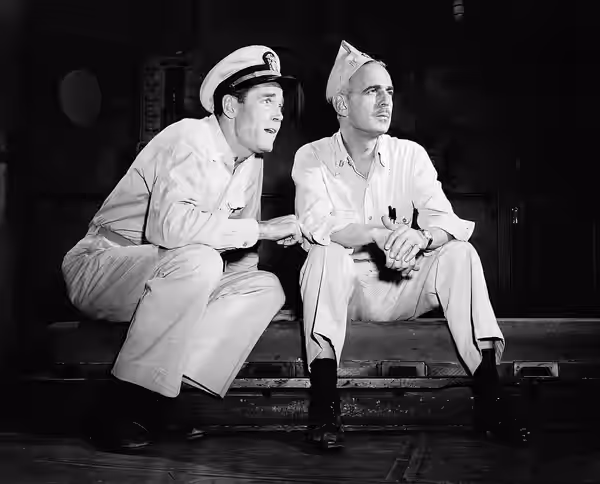 Promotional photograph of Henry Fonda and Paul Stewart in a scene from the Broadway production of Mister Roberts at the Alvin Theatre, New York (1950)