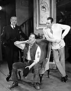 Photo of Robert Coote (Colonel Pickering), Stanley Holloway (Alfred P. Doolittle) and Rex Harrison (Henry Higgins) from the Broadway production of My Fair Lady. (1957)
