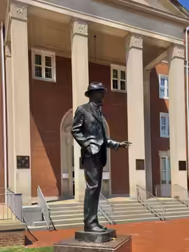 Indiana County Courthouse, Indiana, Pennsylvania, with the statue of locally-born movie star Jimmy Stewart in front. (cropped version) (2018)