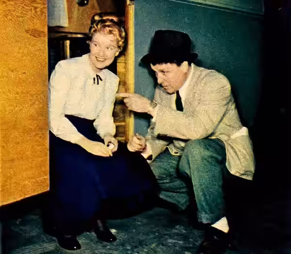 Photo of George Stevens joking with Barbara Bel Geddes on the set of I Remember Mama. (1948)