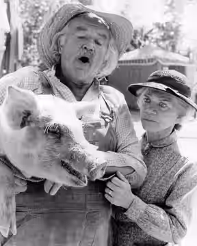 Publicity photo of Will Geer and Ellen Corby as Grandpa and Grandma Walton from the television program The Waltons.