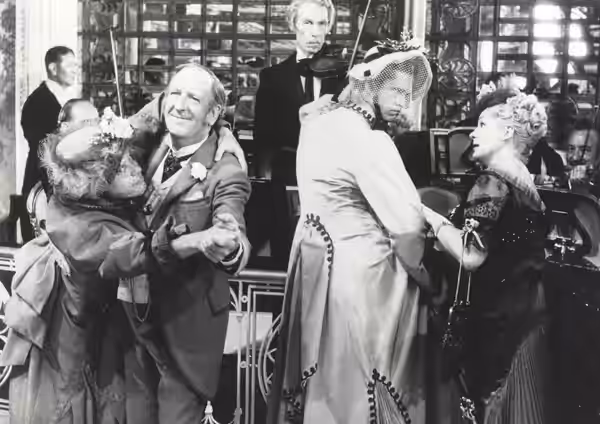 Anthony Perkins (right) and Robert Morse (left) dressed in drag in The Matchmaker (1958)