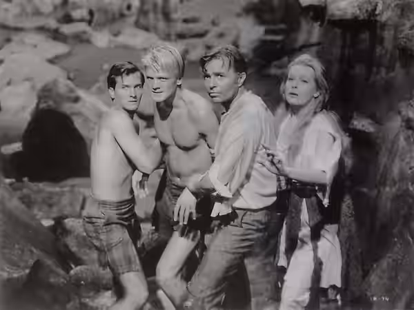 Pat Boone, Peter Ronson, James Mason, and Arlene Dahl in the American science fiction adventure film Journey to the Center of the Earth (1959).