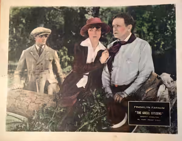 Lobby card for the American drama film The Angel Citizens (1922).