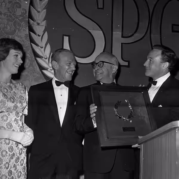 Producer Arthur Freed, center, received the Screen Producers Guild's Milestone Award at a dinner in Beverly Hilton. Julie Andrews, Fred Astaire, left, and Gene  (1964)