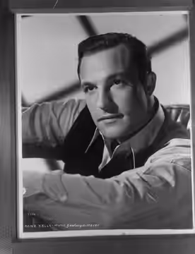 Committee for Free Spain. Portrait of M. Woolf and Jack [possibly Captain Jack White] Taken for the Committee. [Includes photo of film star Gene Kelly].: Sep 19 (1946)