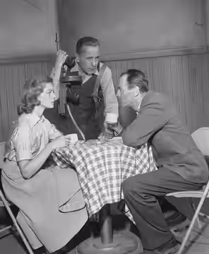 Actors Lauren Bacall, Humphrey Bogart and Henry Fonda in scene from television broadcast play "Petrified Forest"; publication date: May 29, 1955. Petrified Fore