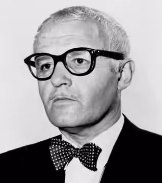 This is a press photo, circulated for publicity, of Rod Steiger in 1964, published in 1971 without copyright notice, qualifying it under public domain.