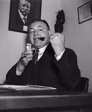 I can lick the bum' Washington, D.C., Nov. 9. Rollicking Tony Galento, Orange, N.J., pubkeeper, sounding off today at the offices of the D.C. Boxing Commission 