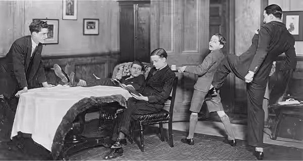 Ainger (Jack Hawkins), Milner (Derrick De Marney), and Woodley (Frank Lawton) watch the eavesdropping Cope (Tony Halfpenny) booted by Vining (Henry Mollison) in (1928)