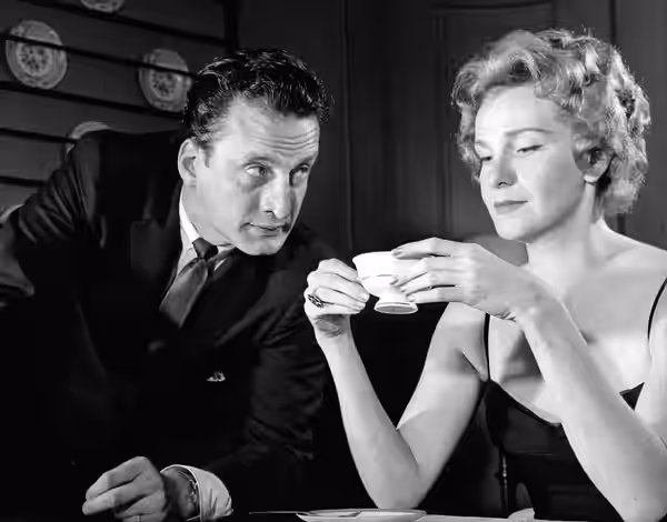Publicity photo of Geraldine Page and George C. Scott. The caption on the back reads: "Geraldine Page plays a tormented woman and George C. Scott is her doctor  (1959)