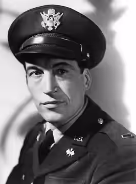 Portrait photograph of John Huston in U.S. Army uniform, published in New Movies, the National Board of Review Magazine (1946)