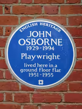 Blue plaque erected 8th May 2021 by English Heritage at 53 Caithness Road, Hammersmith, London, W14 0JD, London Borough of Hammersmith and Fulham. "JOHN OSBORNE