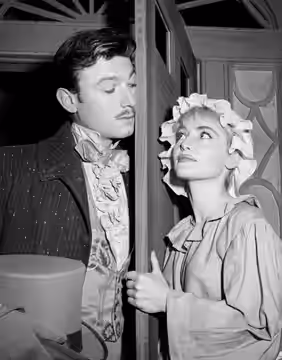 Photo of Laurence Harvey and Diane Cilento in the televisio presentation of the play "The Small Servant". Both made their US television debuts in this productio (1955)