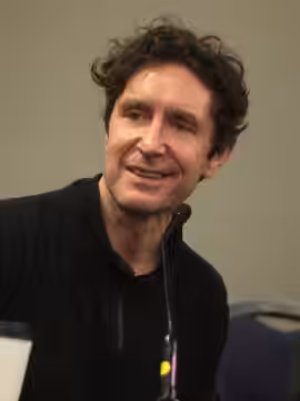 Paul McGann speaking at the 2014 Phoenix Comicon Fan Fest at the University of Phoenix Stadium in Glendale, Arizona. Please attribute to Gage Skidmore if used e