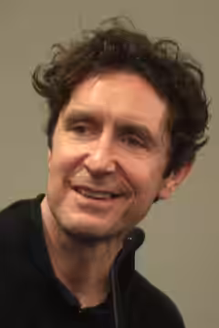 Paul McGann speaking at the 2014 Phoenix Comicon Fan Fest at the University of Phoenix Stadium in Glendale, Arizona. Please attribute to Gage Skidmore if used e