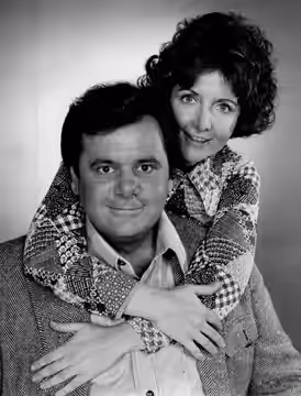 Photo of Paul Sorvino as George Platt and Mitzi Hoag as Liz Platt from the television program We'll Get By. (1975)