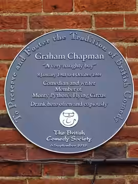 Blue plaque erected by The British Comedy Society on 6th September 2012 at The Angel Inn, 37 Highgate High Street, London N6 5JT (2017)