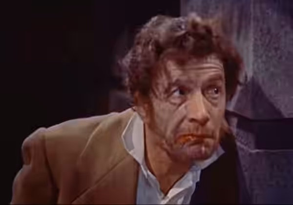 A screenshot of Michael Gwynn as Karl from the Hammer Film The Revenge of Frankenstein (1957) (1958)